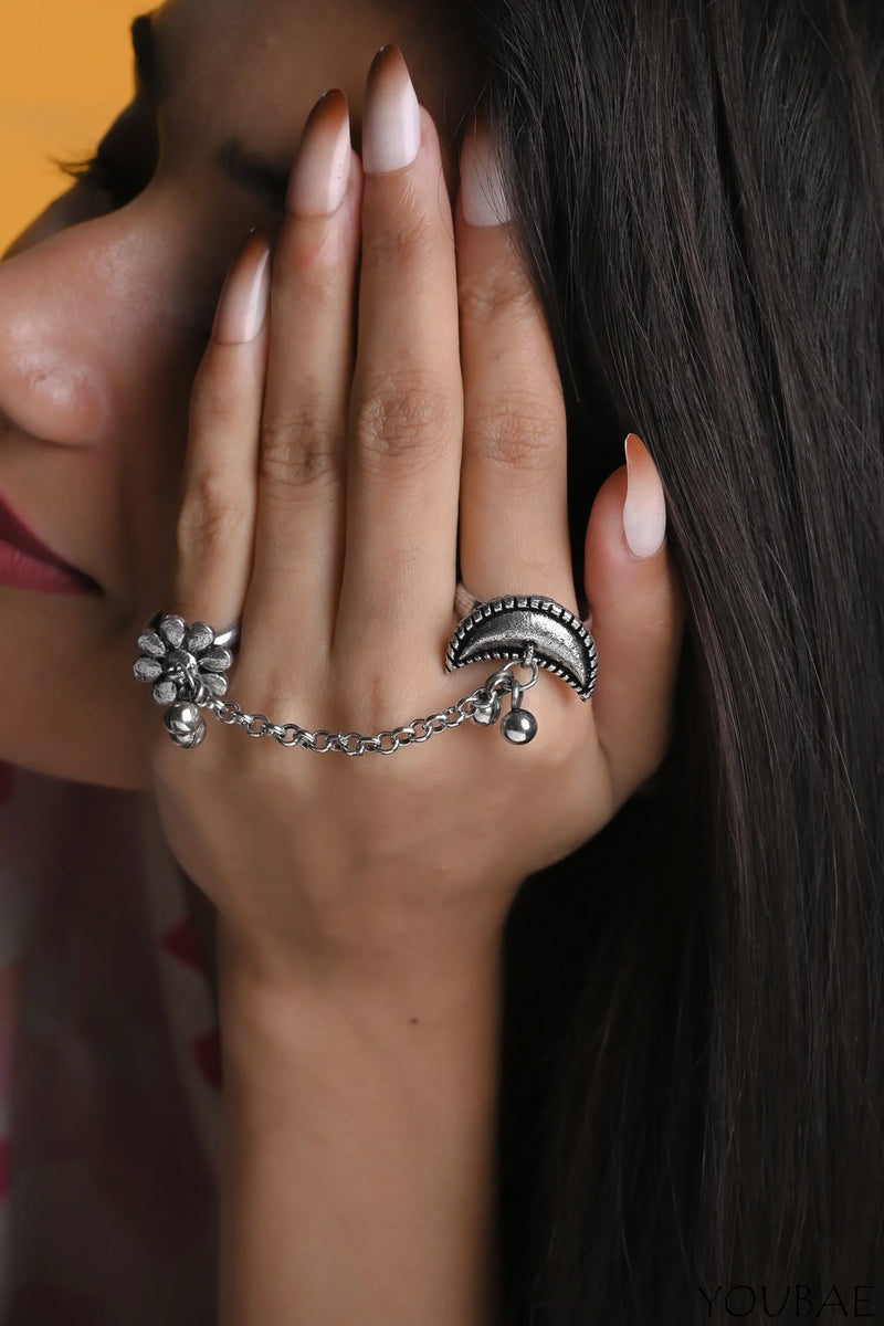 Women's jewelry set featuring two elegant rings with intricate designs, showcasing the 13069 brand.