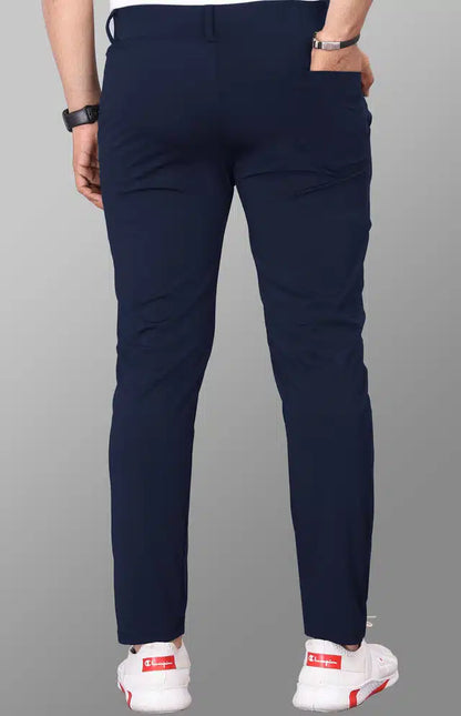Navy blue Lycra blend men's trousers, size 28, with a slim fit design, shown on a model.