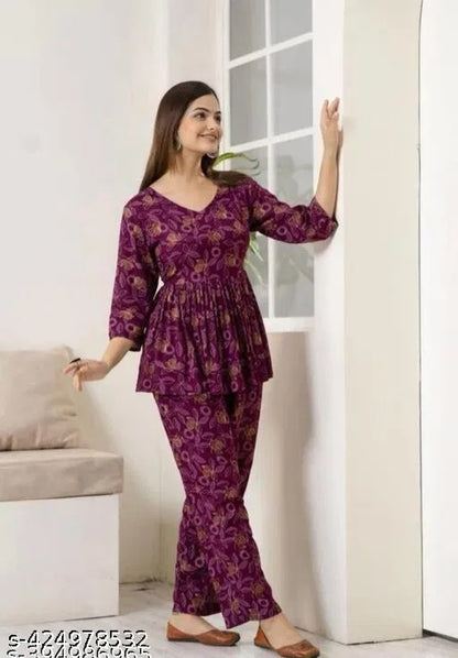 Purple women's printed co-ord set with matching top and pants, stylish and comfortable for girls and women.