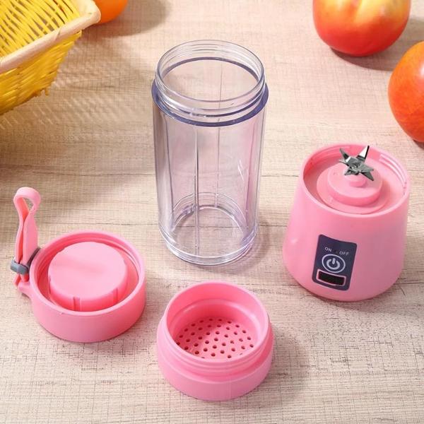 Wukusy 133 portable USB electric juicer with 6 blades, used as a protein shaker for fresh juice blending on the go.