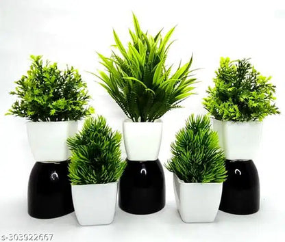 Set of 5 artificial green and white plants with pots, featuring realistic flowers and shrubs for home decor.