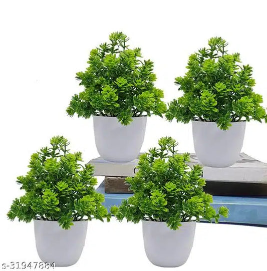 Set of four artificial plants with green and white flowers and shrubs in pots, perfect for home decor and indoor arrangements.
