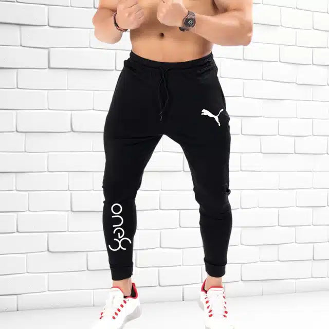 Black polyester men's track pants by 13455, size 28, featuring a comfortable fit and sporty design.