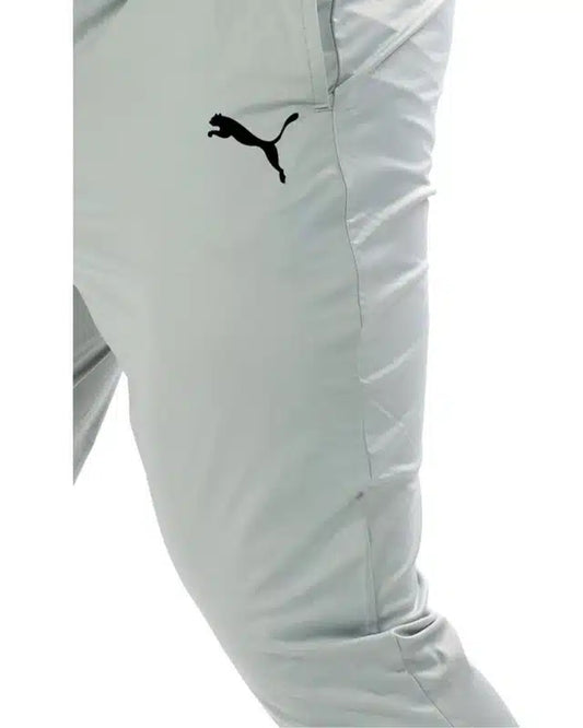 Grey polyester men's track pant with elastic waistband and side pockets, size 28, from 13455 brand.