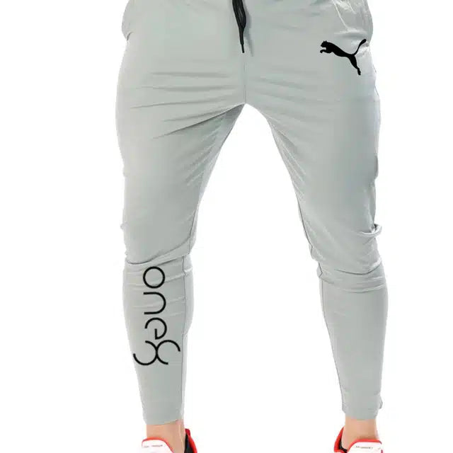 Men's grey polyester track pants, size 28, by 13455, shown laid flat with elastic waistband and tapered fit.