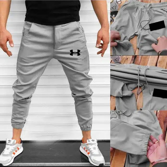 Gray Lycra mens track pants from 13455, comfortable athletic track pants with an elastic waistband and sporty fit.