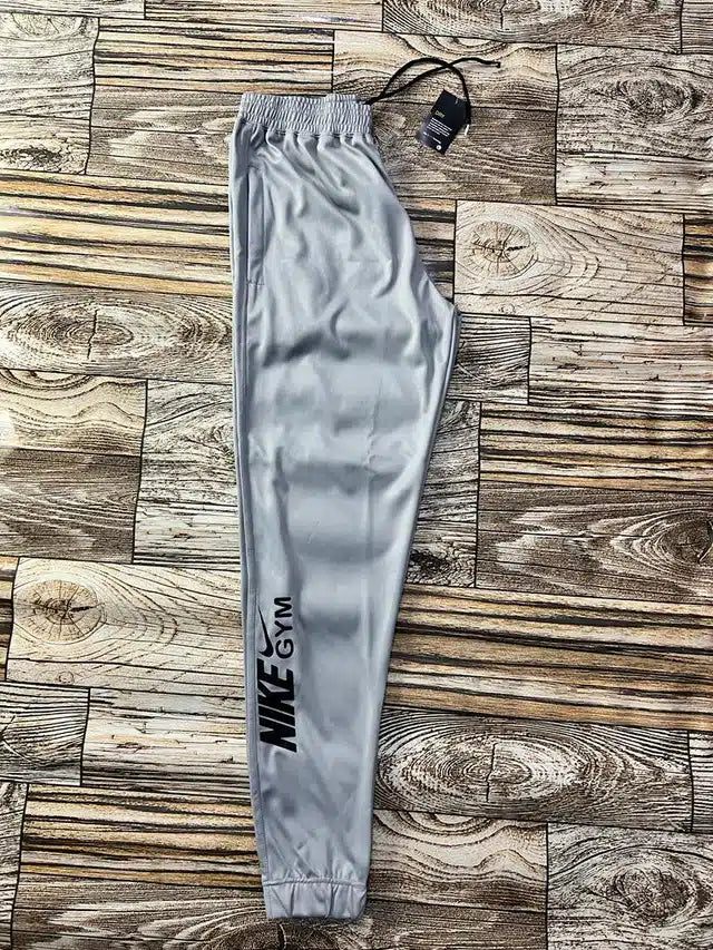 Light grey polyester men's track pant in size 28, featuring a comfortable fit and athletic style from 13455 brand.
