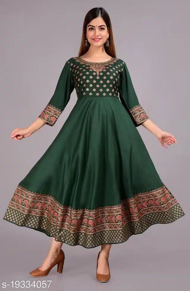 Green rayon printed Anarkali Kurti for women, stylish and comfortable, featuring intricate patterns and a flattering fit.
