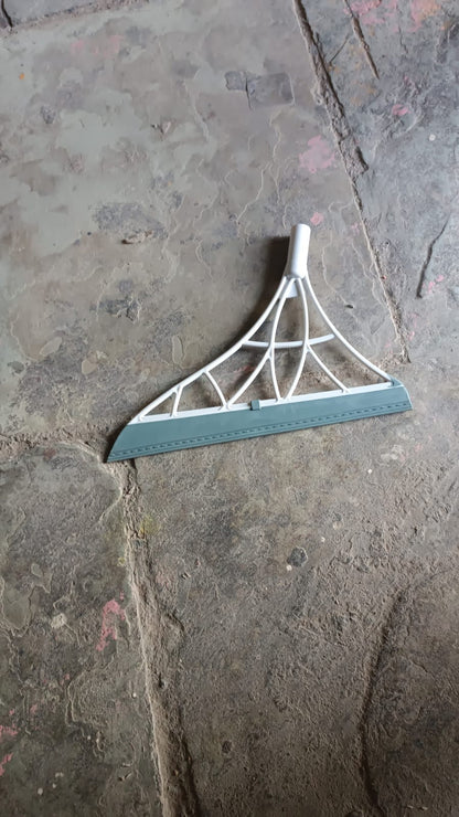 Set of four Wukusy dustpan and squeegee kitchen cleaning tools with broom brushes for window and surface cleaning.