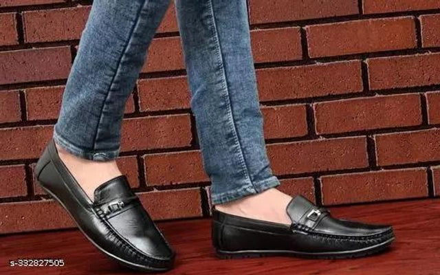 Black and tan men's loafers by 15890, size 6, featuring classic slip-on design and sleek leather finish.