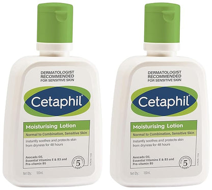 Bottle of Cetaphil moisturizing lotion for normal to combination sensitive skin, with label visible on the white cream container.