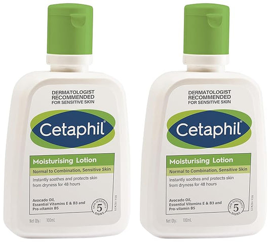 Bottle of Cetaphil moisturizing lotion for normal to combination sensitive skin, with label visible on the white cream container.
