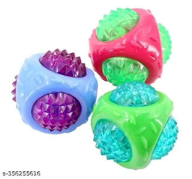 Set of three multicolor silicone chew toys for pets, designed as playful balls for dogs to chew and play with.