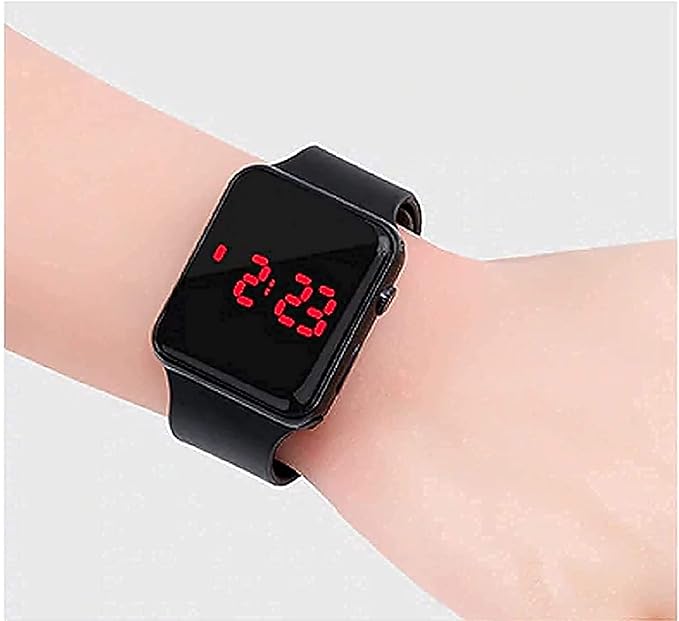 Black LED digital watch for kids by 16001, showing time display on a colorful digital screen in a close-up shot.
