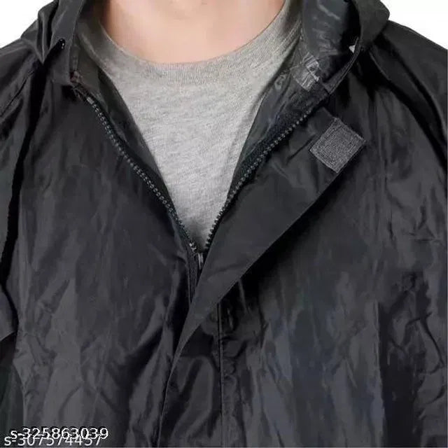 Black polyester rain coat for men from 16824, free size, with a waterproof design and lightweight material for rainy weather.