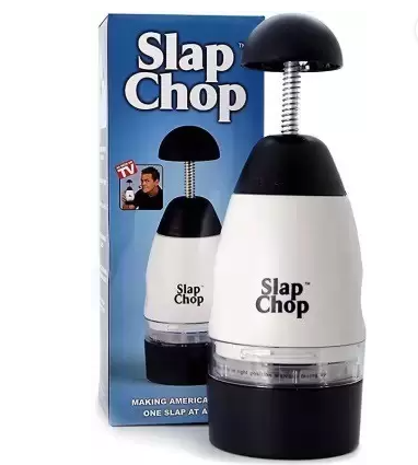 Manual vegetable and dry fruit chopper with stainless steel blade, compact hand press for onions, garlic, fruits, and vegetables.