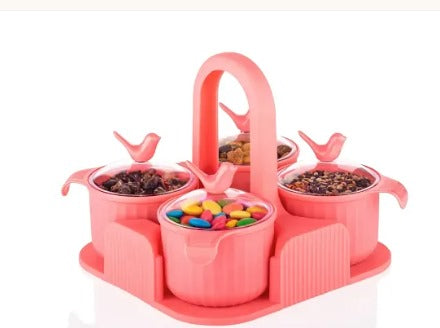Set of four peach airtight storage jars with lids, ideal for snacks, sweets, cookies, and dry fruit storage.