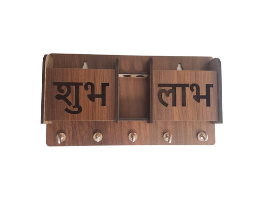 Wooden key holder and phone stand by 18309 featuring Shubh Labh design with hooks for keys and a phone support surface.