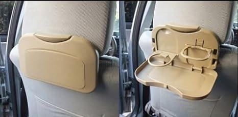 Portable car back seat cup table tray with a cloth surface for convenient meal and drink placement during travel.