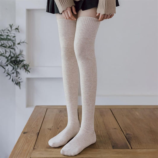 Pair of multicolor woolen knee-length women's socks with thick knit, thigh-high design, perfect for winter warmth from 18052.