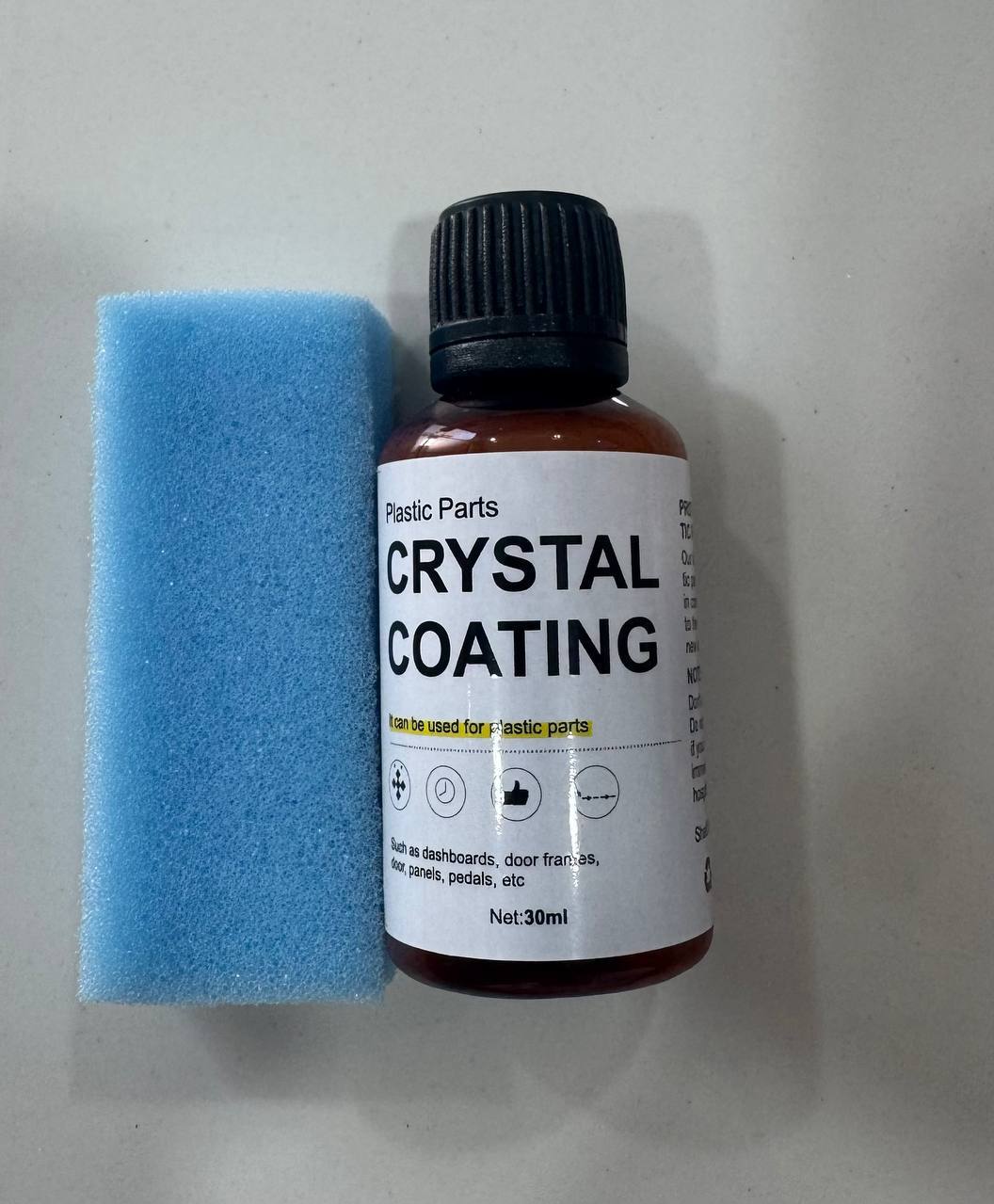 Crystal coating for car plastic parts by 18052, restoring and protecting interior plastics with a long-lasting 30ml treatment.