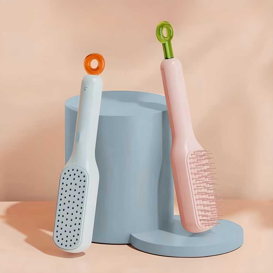 Self-cleaning anti-static massage hair comb by 18052, suitable for adults and kids, shown in the image.
