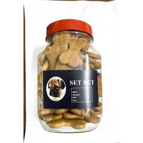 Set of mid-size puppy and dog fresh baked chicken bone biscuits in a 400g package with a pet bed in the background.