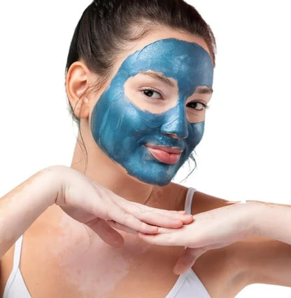 Blue Nila Powder rejuvenating face mask for radiant skin, featuring natural ingredients and soothing texture.