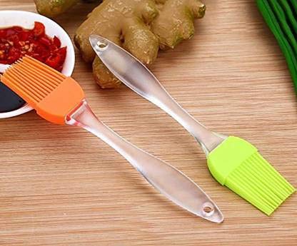 Multicolour Ilicone spatula and pastry brush set for cake decorating, baking, and glazing, with standard size for versatile cooking.