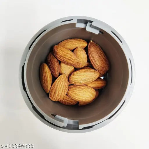 Multicolor plastic dry fruit cutter and slicer for almonds and dry fruits, kitchen gadget by 7233, compact and easy to use.