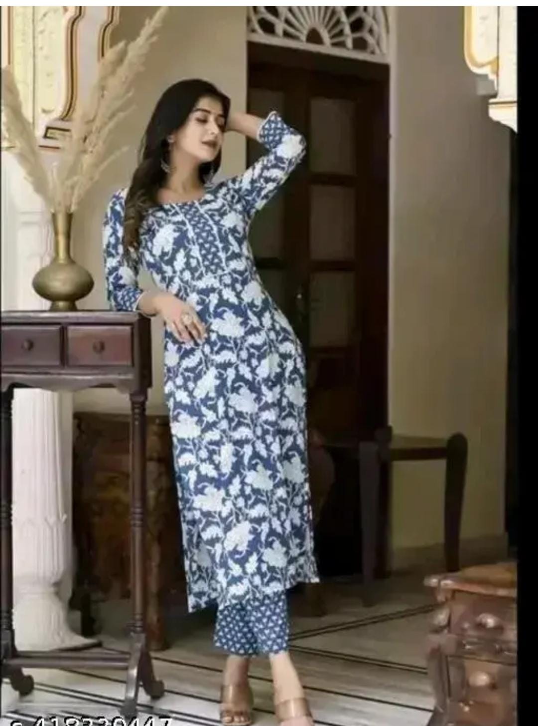 Women's floral round neck kurta set with no dupatta, featuring vibrant print and comfortable fabric from 19199 brand.