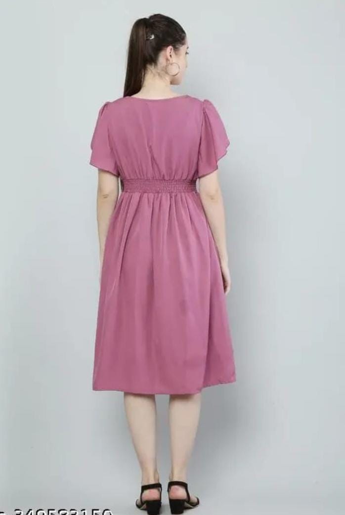 Women’s pink solid viscose rayon fit and flare gown with a sleeveless design, flowing skirt, and fitted bodice.