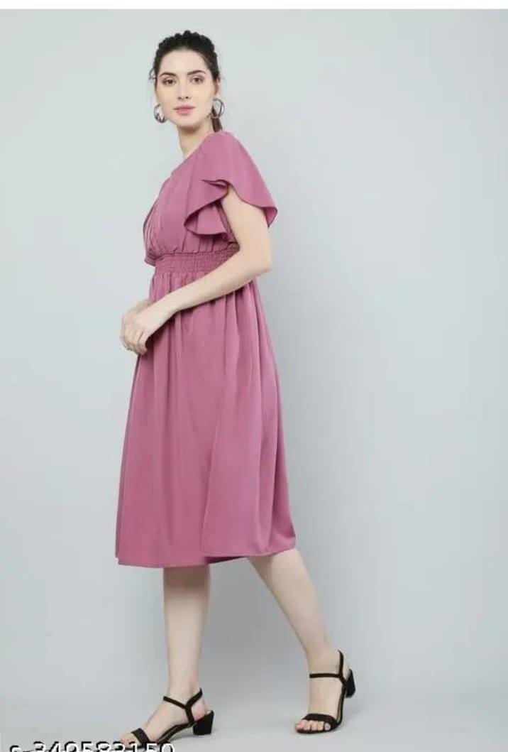 Women’s pink solid viscose rayon fit and flare dress, elegant women's gown with a flattering silhouette and flowy fabric.
