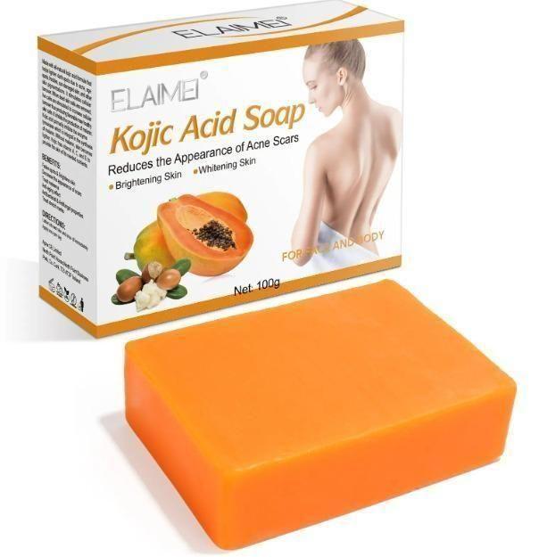 Four 5912 Kojic Acid Bathing Soaps arranged in a pack, featuring white soap bars with branding details visible.