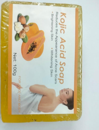 Pack of three 1361 Kojic Acid Bathing Soaps with white and light pink bars, designed for skin brightening and cleansing.