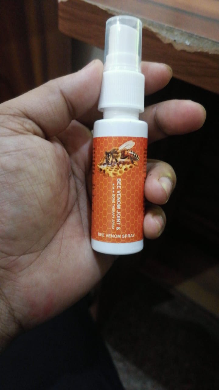Bottle of 5912 Bee Venom Joint Bone Spray, a natural cream for stretch marks, scars, and skin healing, shown in a clear spray bottle.