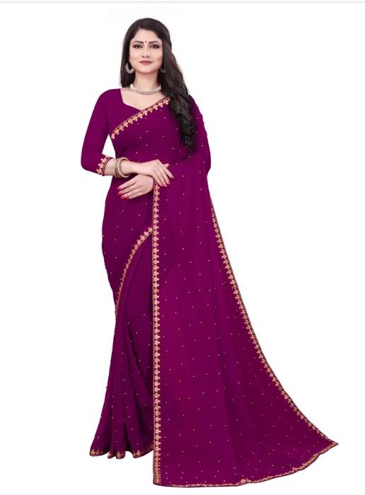 Elegant women's saree from brand 6706 featuring intricate patterns and vibrant colors, draped beautifully.