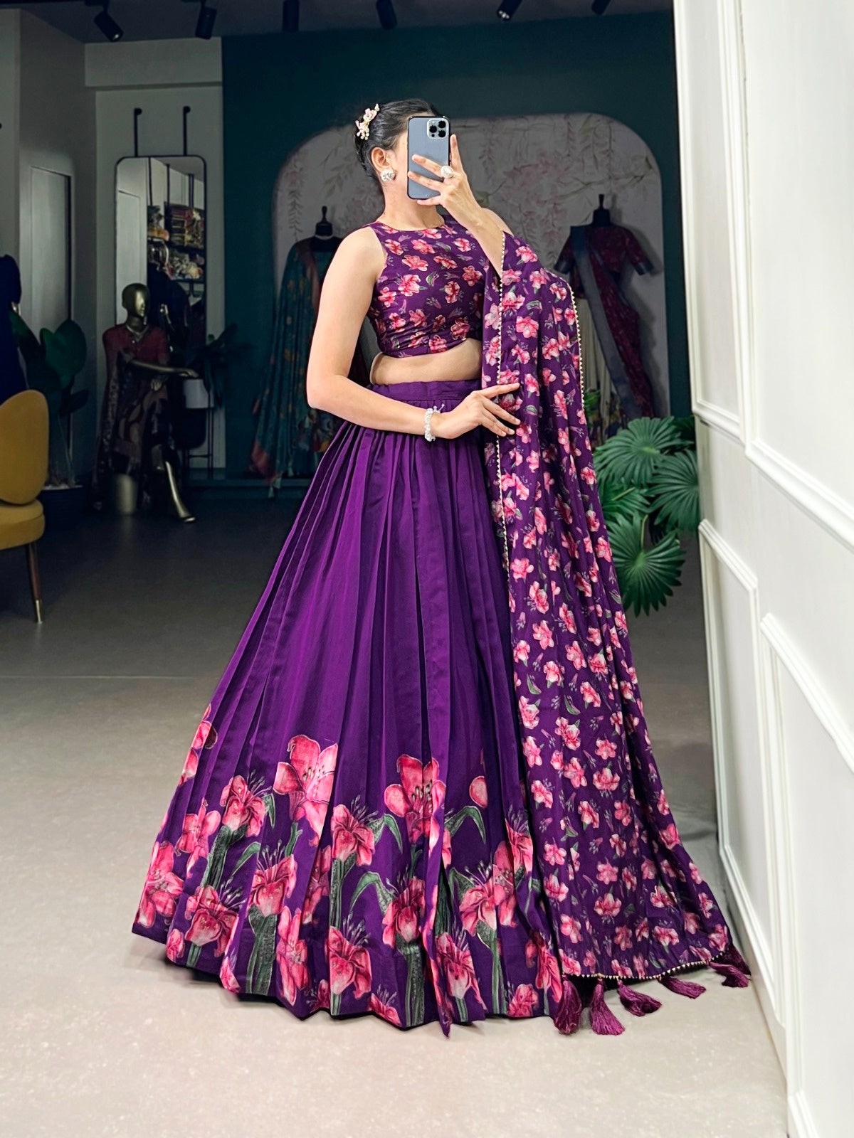 Elegant women's Lehenga Choli with traditional design and sparkling embellishments, featuring intricate embroidery and vibrant colors.