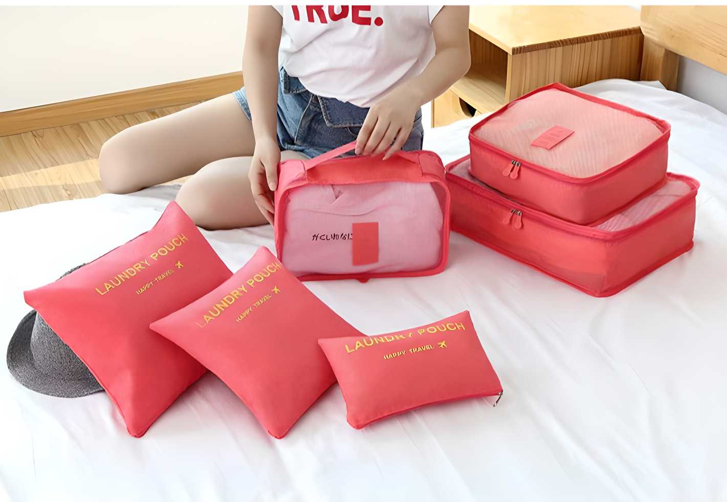 Set of 6 black packing cubes for travel accessories, organized in a clear view showing multiple sizes for efficient packing.