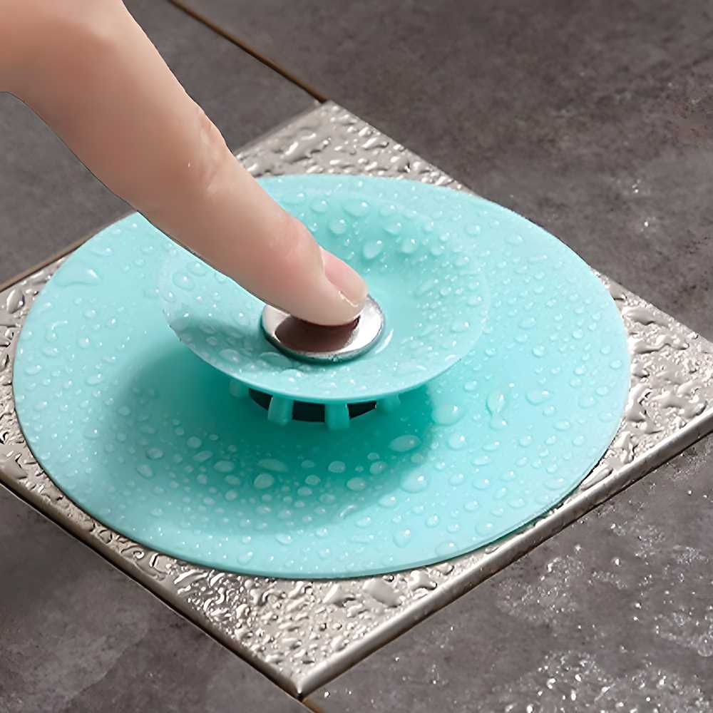Set of three silicone kitchen sink strainers in assorted colors, durable household kitchen tool set for trapping debris.