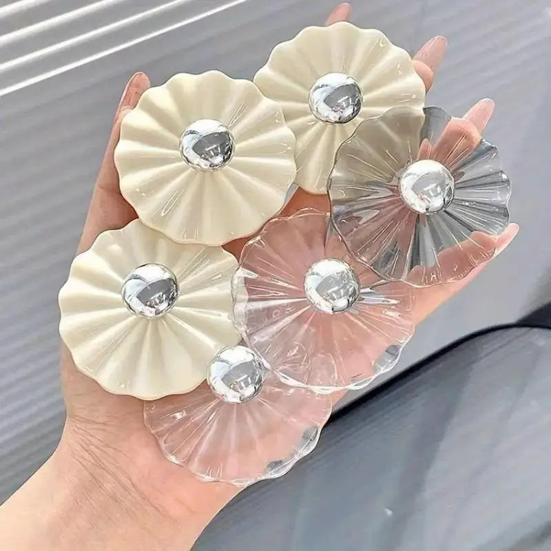 Set of five petal-shaped adhesive wall hooks from 19378, perfect for kitchen organization and easy to install.