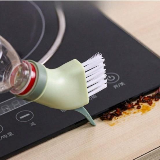 Multi-use cleaning brush from 19378 kitchen tool set with ergonomic handle and stiff bristles for versatile cleaning tasks.