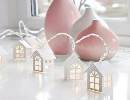 White home string lights for Diwali decorations, featuring the 19378 brand, displayed hanging with glowing bulbs.