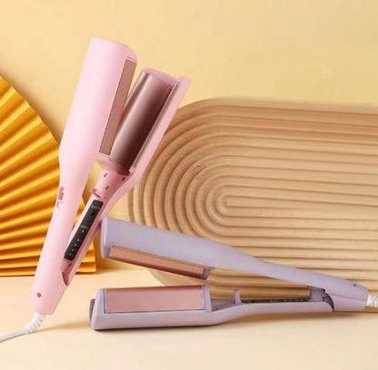 Professional French egg roll curling iron by 19378, showing the heated barrel and ergonomic handle for curling hair.