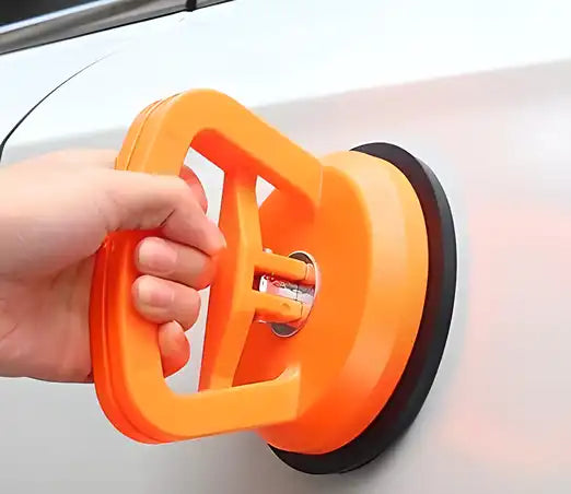 Kitchen tool set with Dent Puller Suction Cup for removing dents from smooth surfaces, durable plastic construction.