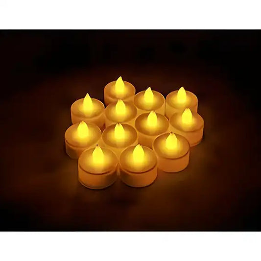 Pack of 12 yellow LED tea light candles for Diwali decorations, eco-friendly diya lights for home festive decor.