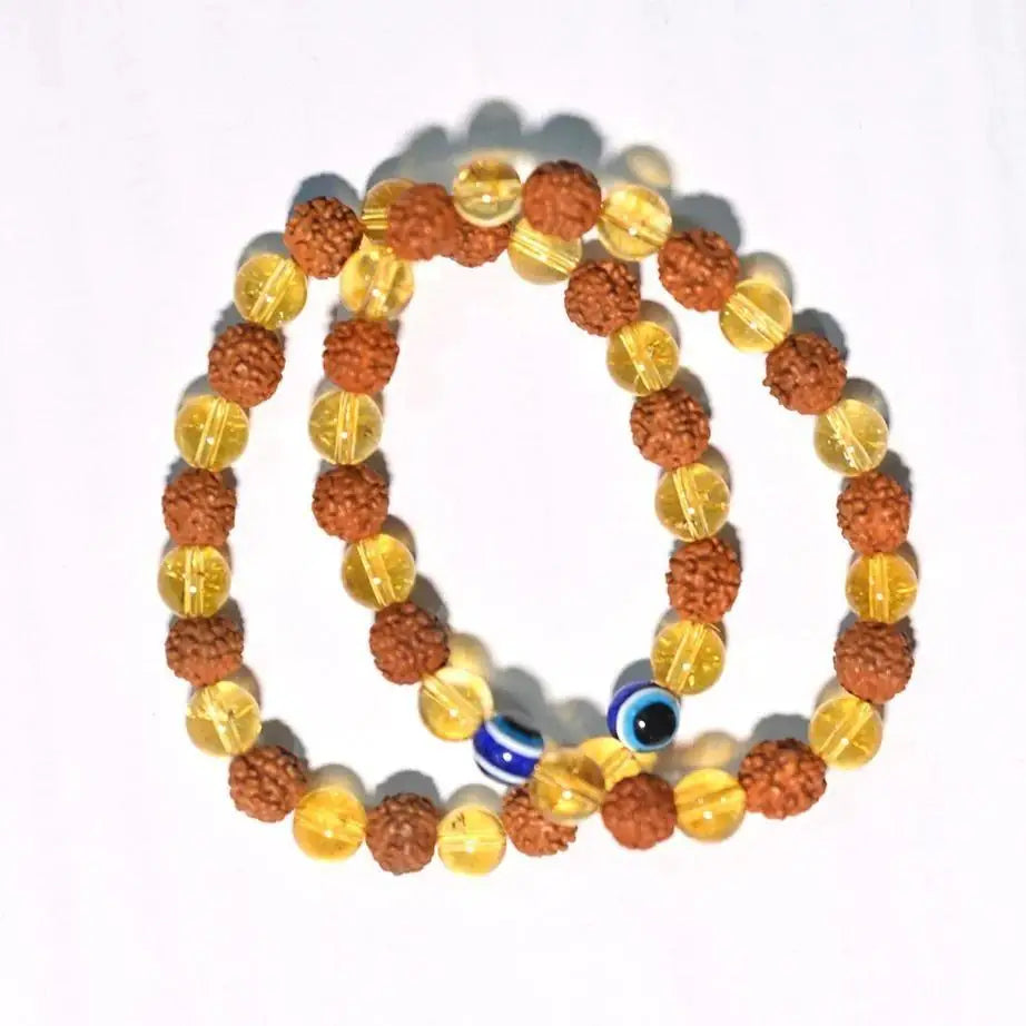 Pair of Rudraksha Citrine Crystal bracelets for prayer and meditation, featuring natural beads and sacred stone accents.