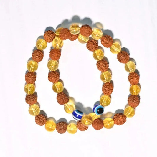 Pair of Rudraksha Citrine Crystal bracelets for prayer and meditation, featuring natural beads and sacred stone accents.