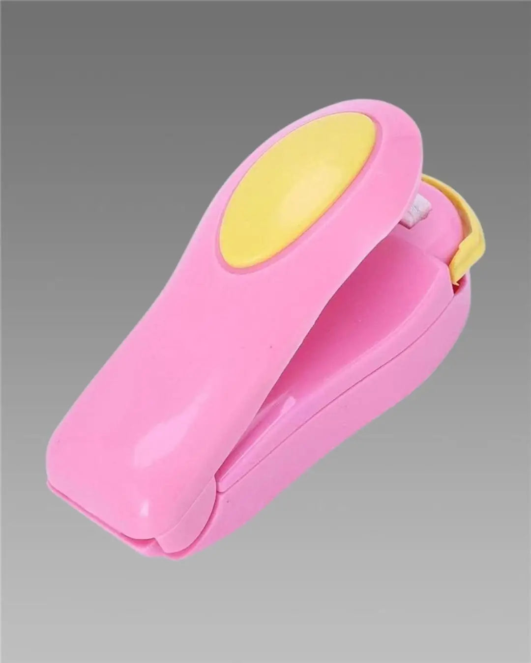 Multicolour portable small heat sealer machine for food storage, sealing plastic, snack, and vacuum bags in kitchen tool set.