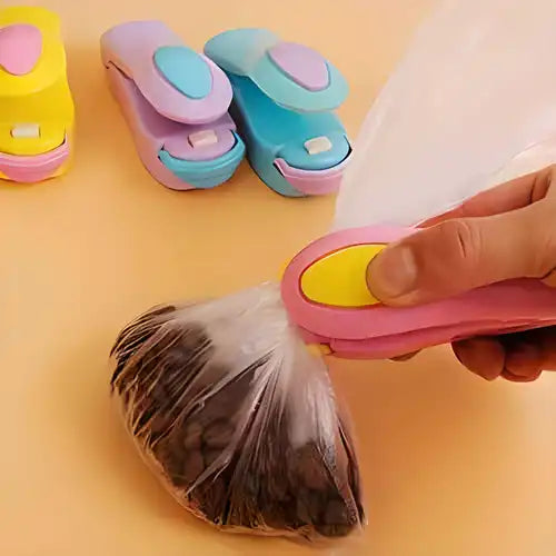 Portable handheld Smart Bag Sealer for vacuum and plastic bags, ideal for sealing snacks, chips, and food storage bags.